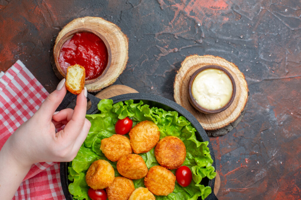 Enjoy crispy, juicy air fryer chicken nuggets with a healthy twist! This easy recipe reduces fat by 75% and delivers flavor in every bite.